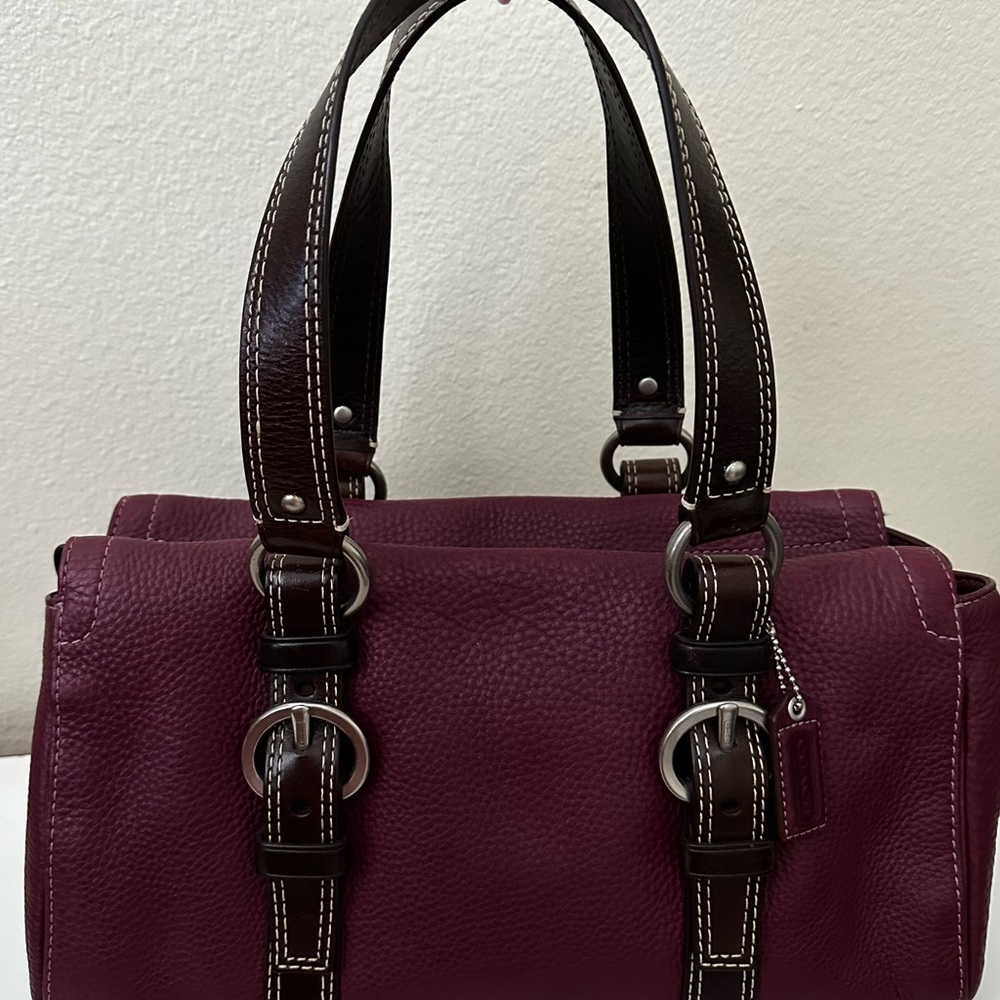 Coach leather satchel in burgundy.  Pre-owned excellent condition.
